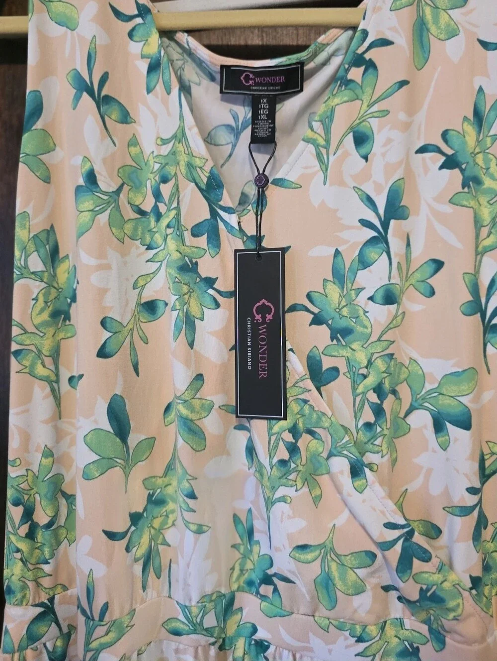 C. Wonder Pink Jumpsuit with Green and White Leaf Design